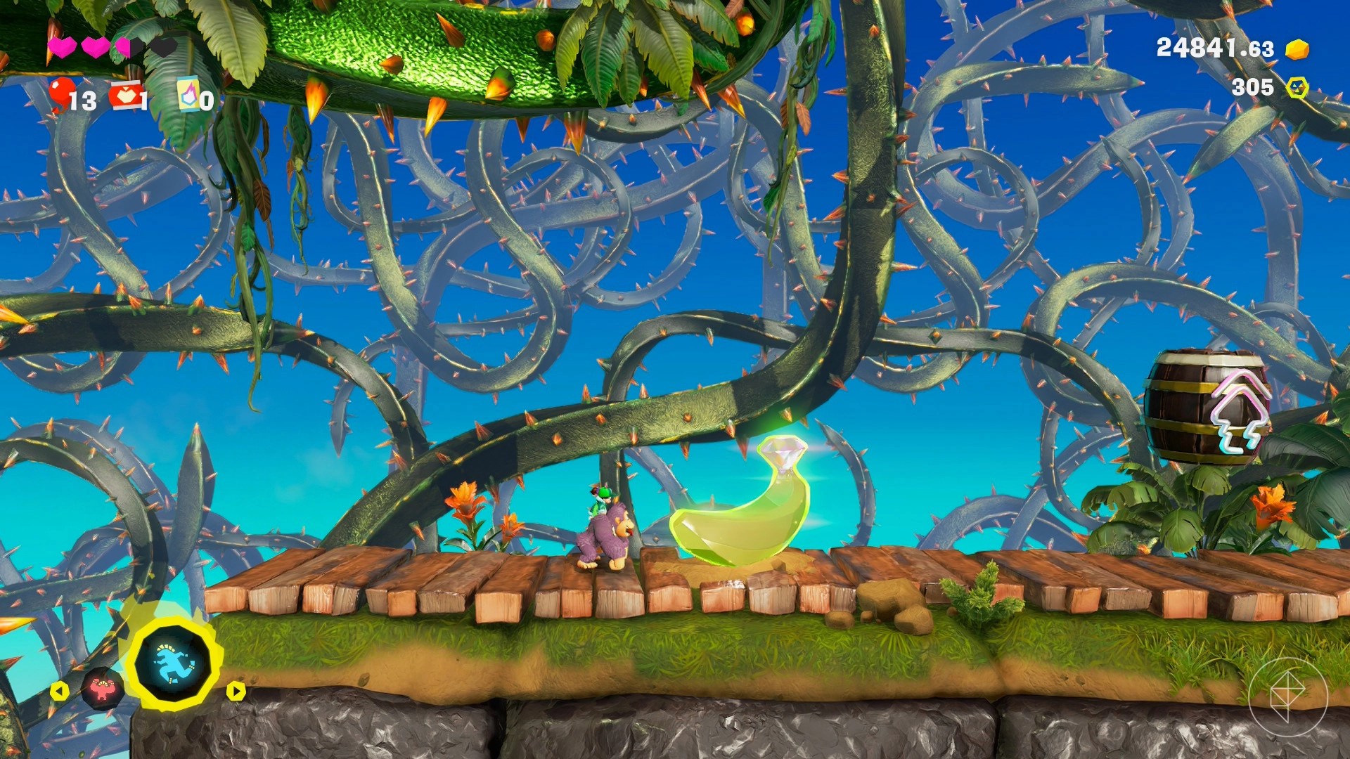 DK drools in front of a banana on a 2D platform surrounded by thorns.